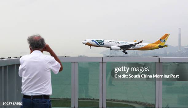 Cebu Pacific Air passenger plane lands the Hong Kong International Airport located in Chek Lap Kok, Lantau. 26MAY15