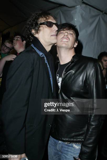 Mick Rock and Donovan Leitch during DKNY Jeans Presents "Mick Rock Live in L.A." Exhibit at the Lo-Fi Gallery at Lo-Fi in Los Angeles, California,...