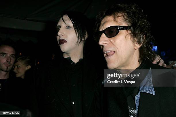 Marilyn Manson and Mick Rock during DKNY Jeans Presents "Mick Rock Live in L.A." Exhibit at the Lo-Fi Gallery at Lo-Fi in Los Angeles, California,...