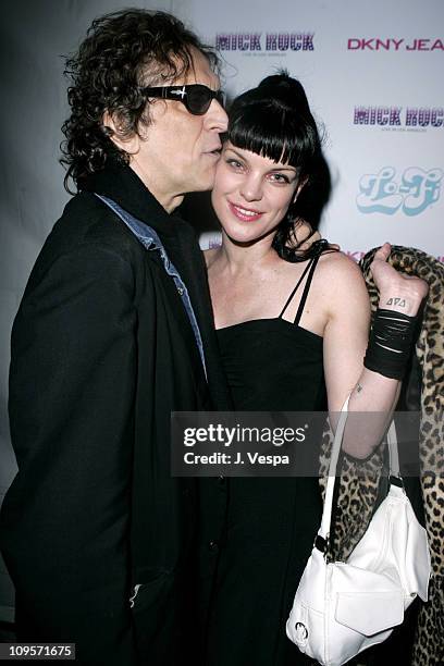 Mick Rock and Pauley Perrette during DKNY Jeans Presents "Mick Rock Live in L.A." Exhibit at the Lo-Fi Gallery at Lo-Fi in Los Angeles, California,...
