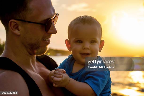 godparent and his young nephew - godfather stock pictures, royalty-free photos & images