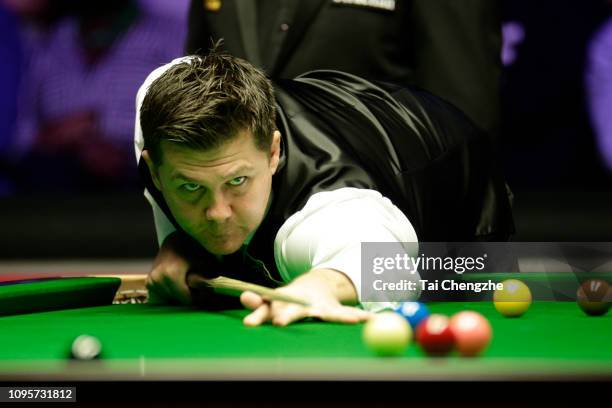 Ryan Day of Wales plays a shot during his quarter-final match against Ronnie O'Sullivan of England on day five of the 2019 Dafabet Masters at...