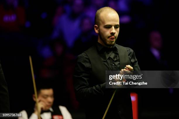 Luca Brecel of Belgium reacts during his quarter-final match against Ding Junhui of China on day five of the 2019 Dafabet Masters at Alexandra Palace...