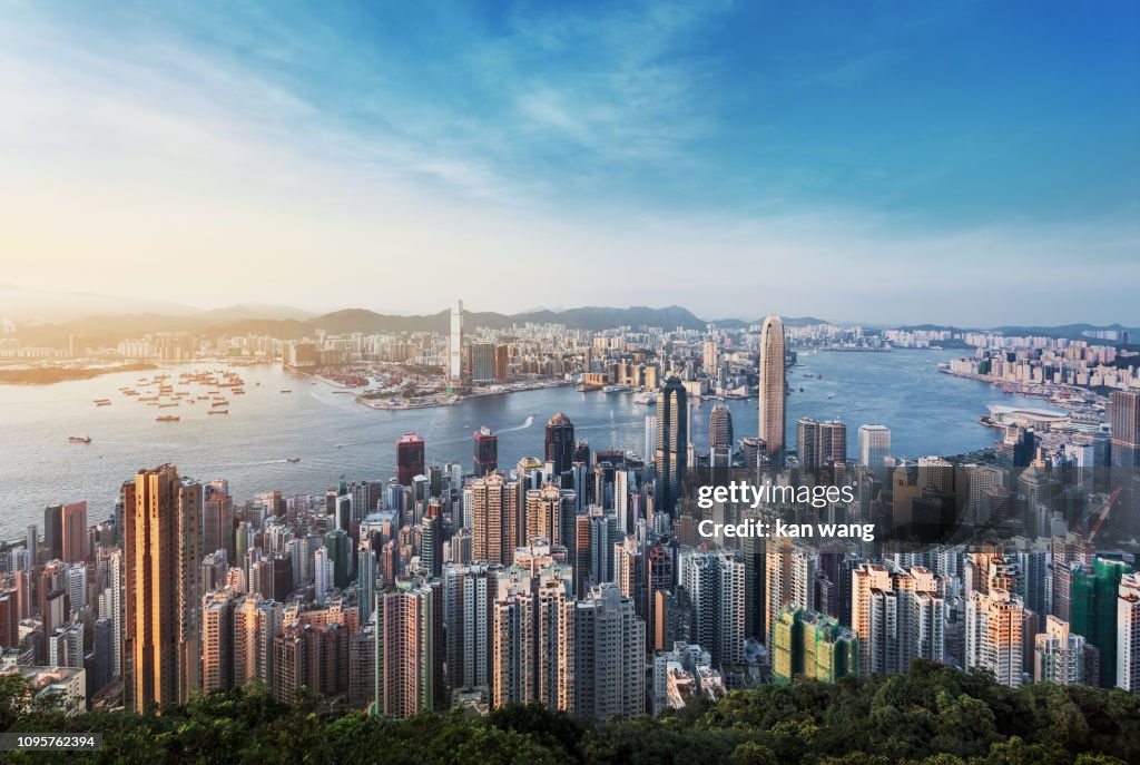 Hong Kong Skyline China - East Asia Skyscraper Cityscape Day Victoria Harbour - Hong Kong Ship Sunset Futuristic Island Architecture Asia Blue City Cloud - Sky Cloudscape Development District Downtown Dusk Famous Place Harbour Hong Kong Island Horizontal