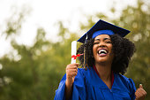 Portriat of a young African American Woman at graduation.