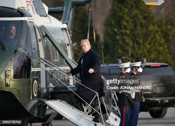 President Donald Trump boards Marine One upon departure from Walter Reed National Military Medical Center in Bethesda, Maryland on February 8, 2019....
