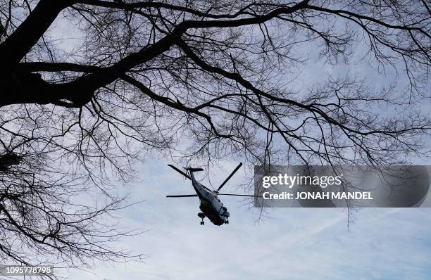 Marine One with US President Donald Trump on board lifts off upon departure from Walter Reed National Military Medical Center in Bethesda, Maryland...