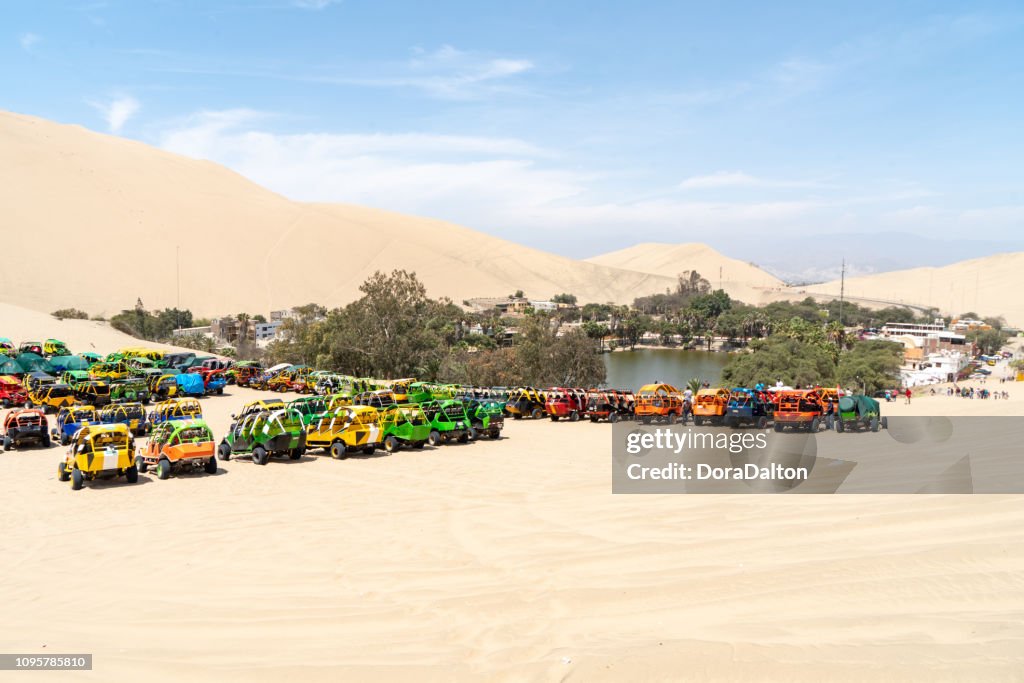 Beach buggy on beside Oasis in Huacachina, Peru