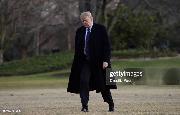 President Donald Trump returns to the White House after receiving his annual physical exam at Walter Reed National Military Medical Center on...