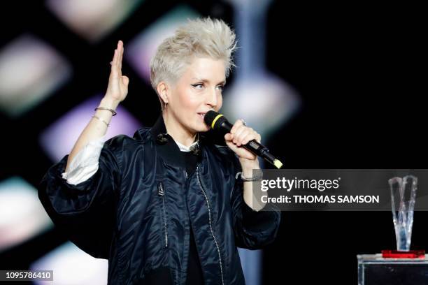 French singer Jeanne Added celebrates after receiving the the best rock album award during the 34th Victoires de la Musique, the annual French music...