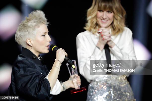 French singer Jeanne Added celebrates after receiving the the best rock album award during the 34th Victoires de la Musique, the annual French music...