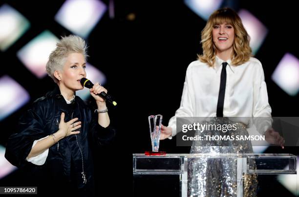 French singer Jeanne Added celebrates after receiving the the best rock album award during the 34th Victoires de la Musique, the annual French music...