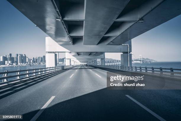 pavement on bridge - metal surface stock-fotos und bilder