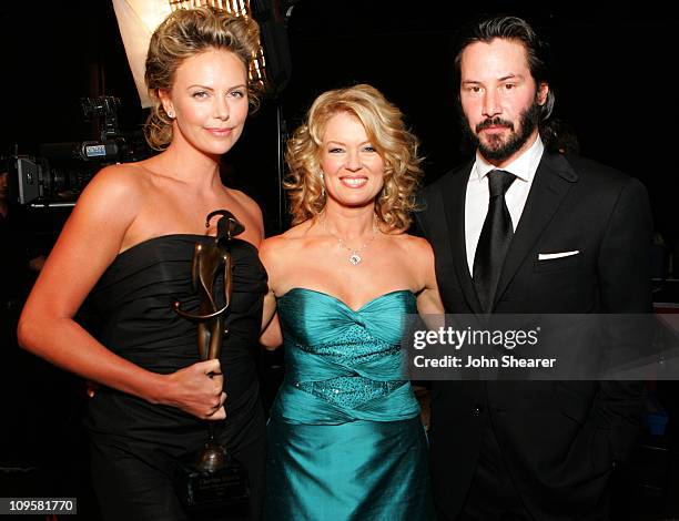 Charlize Theron, recipient of the Desert Palm Achievement Award , Mary Hart and Keanu Reeves