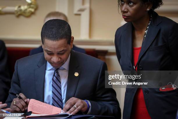 Virginia Lt. Governor Justin Fairfax reads over a document on the Senate floor at the Virginia State Capitol, February 8, 2019 in Richmond, Virginia....