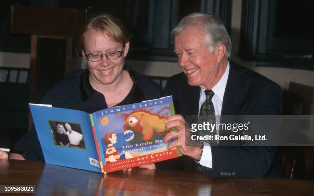 Amy Carter and Jimmy Carter during "The Little Baby Snoogle Fleejer" Autographing Party - December 13, 1995 at Barnes & Noble Bookstore in New York...