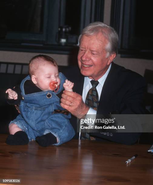 Baby and Jimmy Carter during "The Little Baby Snoogle Fleejer" Autographing Party - December 13, 1995 at Barnes & Noble Bookstore in New York City,...