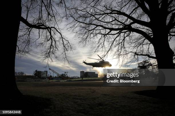 Marine One, carrying U.S. President Donald Trump, leaves Walter Reed National Military Medical Center in Bethesda, Maryland, U.S., on Friday, Feb. 8,...