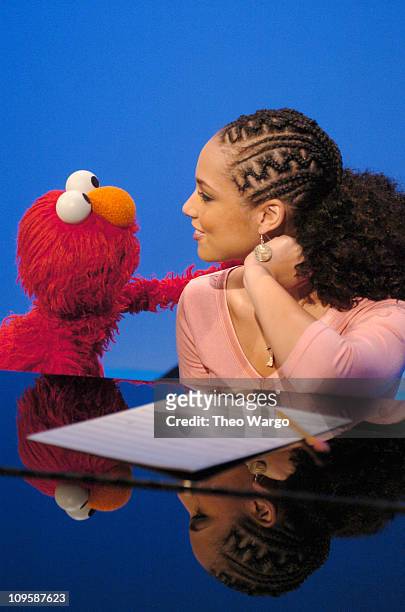 Alicia Keys joins her favorite dance partner Elmo on Sesame Street. The duo sang "Dancin" a rendition of her hit song "Falling". This will air as...