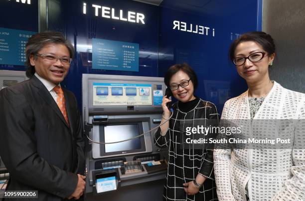 Keith Au, General Manager of NCR Hong Kong & Taiwan; Carmen Yip, Executive Vice President and Head of Retail Banking Group of Fubon Bank ; and Murine...
