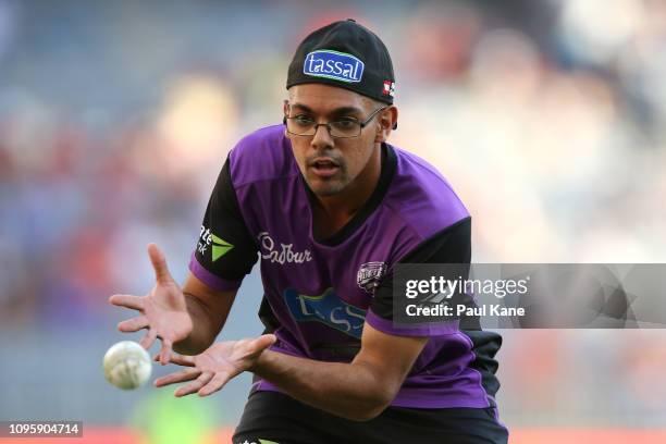 Clive Rose of the Hurricanes warms up before the Big Bash League match between the Perth Scorchers and the Hobart Hurricanes at Optus Stadium on...