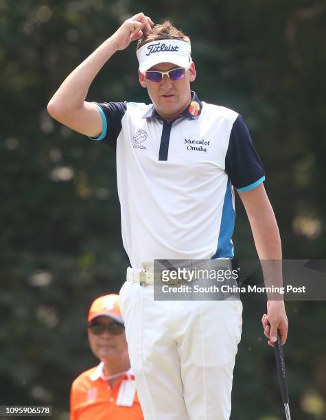 Ian Poulter lines up a putt during the 57th UBS Hong Kong Open at the Hong Kong Golf Club in Fanling. 22OCT15