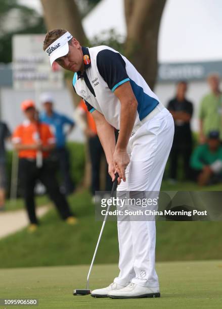 Ian Poulter lines up a putt during the 57th UBS Hong Kong Open at the Hong Kong Golf Club in Fanling. 22OCT15