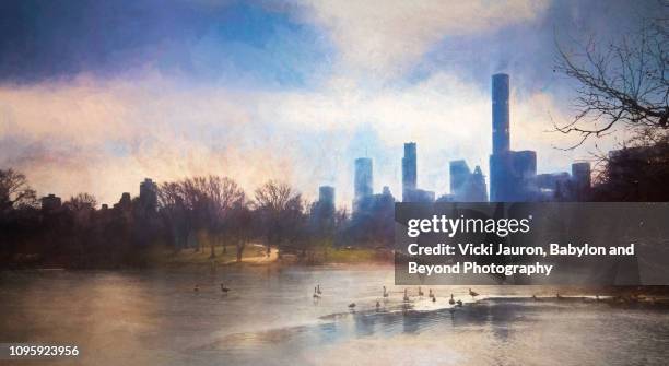 artistic scene of the lake and skyscrapers in the background at central park, new york - new york gemälde stock-fotos und bilder