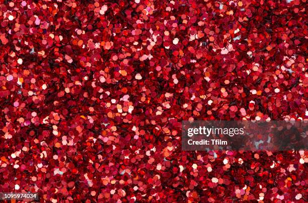 abstract carborundum red color background - red glitter stock pictures, royalty-free photos & images