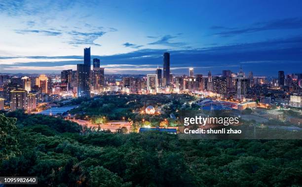 bustling city - zhongshan stock pictures, royalty-free photos & images