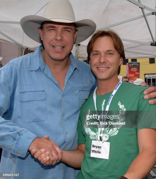 Michael Peterson and Bryan White during CMA Music Festival - Michael Peterson/New Holland Celebrity Tractor Race at Sports Zone in Nashville,...
