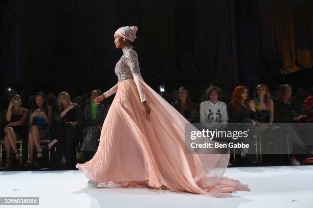 Halima Aden walks the runway for the Sherri Hill Show during New York Fashion Week February 2019 on February 8, 2019 in New York City.