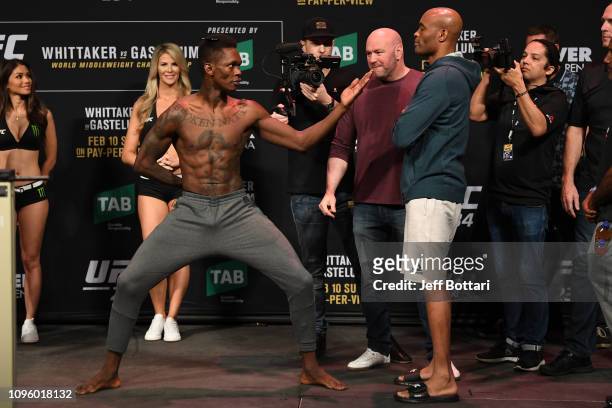 Israel Adesanya of New Zealand and Anderson Silva of Brazil face off during the UFC 234 weigh-in at Rod Laver Arena on February 09, 2019 in the...