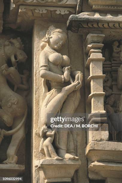 Relief depicting a Surasundari , Parshvanatha temple, Khajuraho group of Monuments , Madhya Pradesh, India, 10th century.