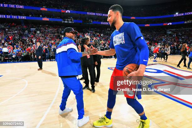 Legend Allen Iverson and Ben Simmons of the Philadelphia 76ers high five during the game against the Denver Nuggets on February 8, 2019 at the Wells...