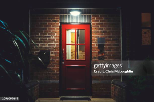 red entrance door - leeds city centre stock-fotos und bilder