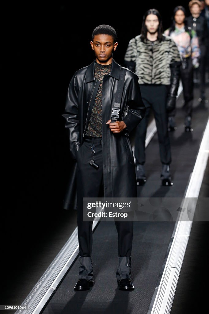 A model walks the runway during the Dior Homme Menswear Fall/Winter ...