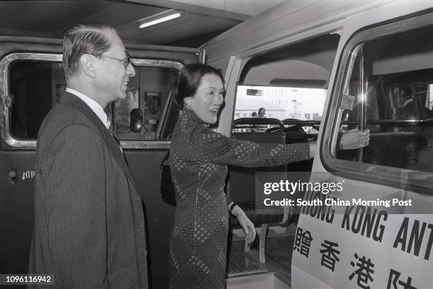 Pictured here are H. C. Ho of the Hong Kong Anti-Cancer Society and Mrs Mabel Woo Russel of the Soroptimist International Club. 14DEC77