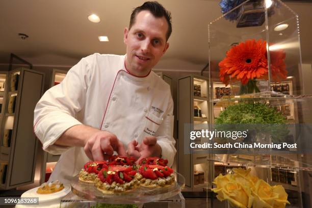 Peninsula Boutique Summer showcase: Pastry Chef Frank Haasnoot poses with his creation Framboises at The Peninsula Boutique, The Peninsula Arcade,...