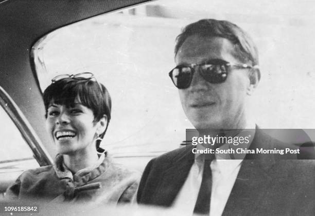 Actor Steve McQueen and wife Neile Adams leaving Kai Tak for their hotel. The actor is here for the location shooting of the 20th Century Fox film...