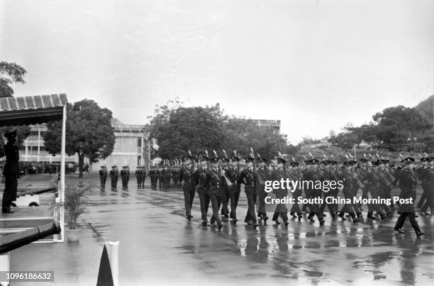 Passing-out parade staged by policemen at the Aberdeen police training school. 31DEC77