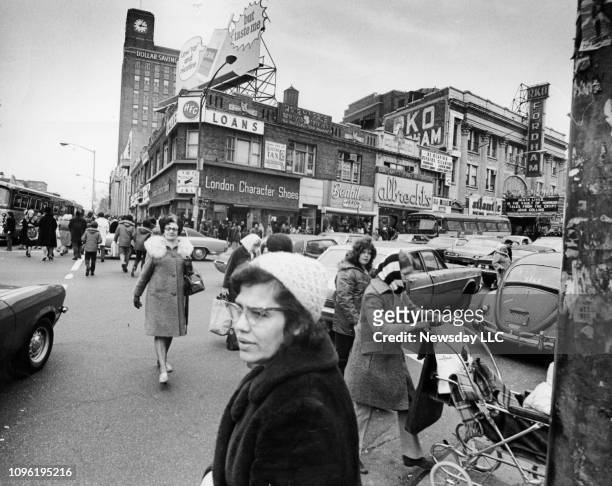 People walk through the center of the shopping area on Fordham Road at the Grand Concourse in the Bronx, New York on March 31, 1972.