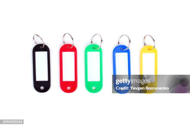 colorful collection of a key fob on white background. - trousseau de clés photos et images de collection