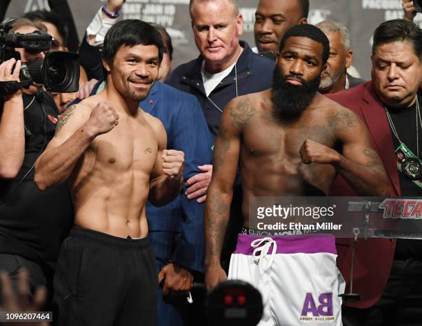 Welterweight champion Manny Pacquiao and Adrien Broner pose during their official weigh-in at MGM Grand Garden Arena on January 18, 2019 in Las...