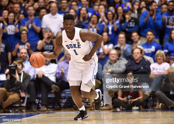 Zion Williamson of the Duke Blue Devils moves the ball against the Princeton Tigers during their game at Cameron Indoor Stadium on December 18, 2018...