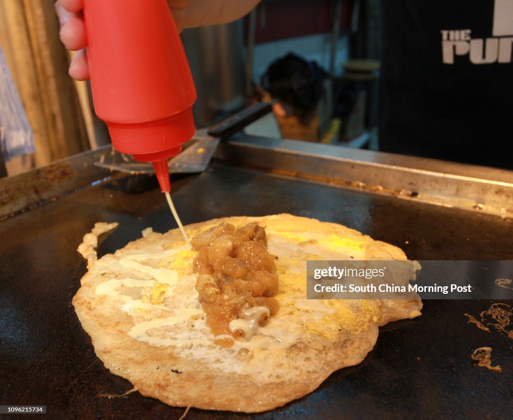 This image shows Taiwanese scallion pancake by TFive degree shop, a street food stall at Lung Mun Oasis in Tuen Mun. 25MAY16 SCMP / May Tse
