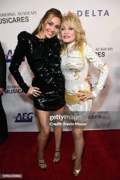 Miley Cyrus and Dolly Parton attend MusiCares Person of the Year honoring Dolly Parton at Los Angeles Convention Center on February 8, 2019 in Los...