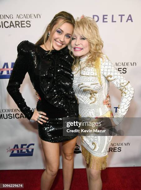 Miley Cyrus and Dolly Parton attend MusiCares Person of the Year honoring Dolly Parton at Los Angeles Convention Center on February 8, 2019 in Los...