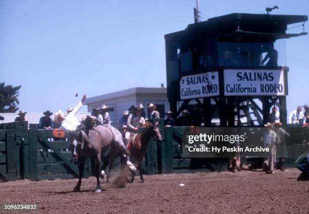 California Riverside Rodeo An unidentified man rides a bronco during the California Rodeo on ...