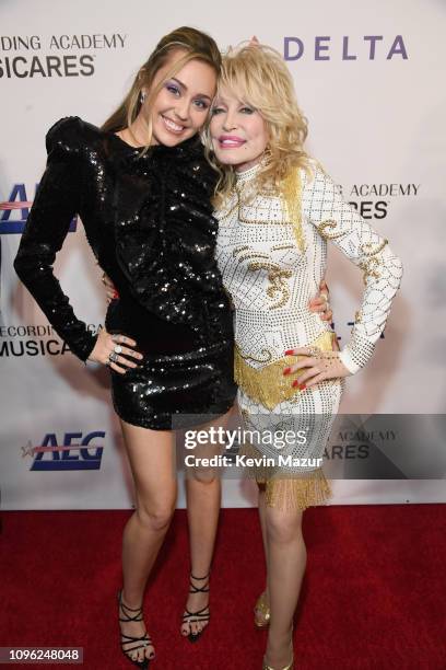 Miley Cyrus and Dolly Parton attend MusiCares Person of the Year honoring Dolly Parton at Los Angeles Convention Center on February 8, 2019 in Los...